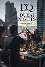 Group celebrating with D'Q Dubai Nights perfume against a city skyline backdrop, enjoying an evening together.
